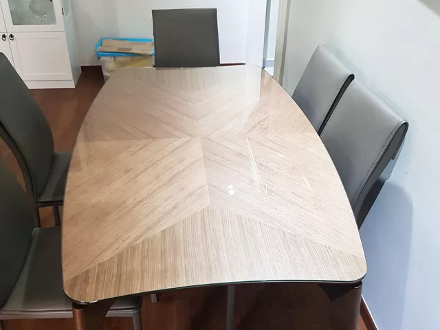 glass top curve dining table